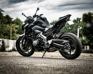 Fototapeta na wymiar Black rider on the black motorbike