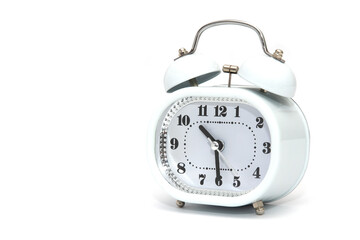An alarm clock isolated on a white background, an alarm clock with a hammer hits the alarm cups