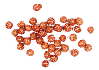 Caramelised hazelnuts, roast nuts in sugar caramel isolated on white