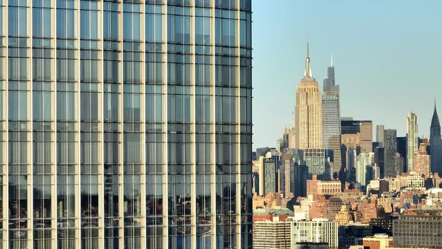 Midtown Manhattan with Empire State Building - aerial reveal shot - drone photography