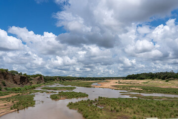 white clouds over the olifants river on a sunny day 