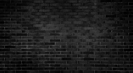 dark black brick wall texture used as background, brick wall texture for interior or exterior design. backdrop in vintage dark color tone. empty, old, dark grey brick wall background with copy space.