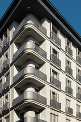 Corner of a modern building with balconies.