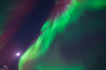 Aurora borealis and moon. Finland