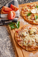 TRADITIONAL ITALIAN PIZZA with buffalo mozzarella and basil
