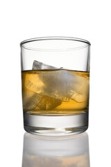 Cocktail whiskey with ice and lime in a low glass with reflection close up