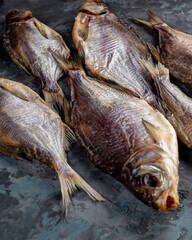 Salted dried roach fish. Fish appetizer for beer