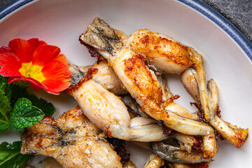 fried frog legs meat cuisine french food healthy meal food snack on the table copy space food background rustic top view