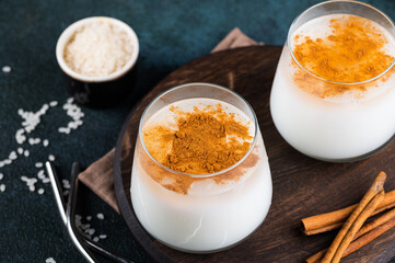 Delicious Horchata with cinnamon in the top. Rice water. Valencian Horchata made with rice, milk and cinnamon topping. Mexican drink. Vegetarian cocktail. Rice milk.