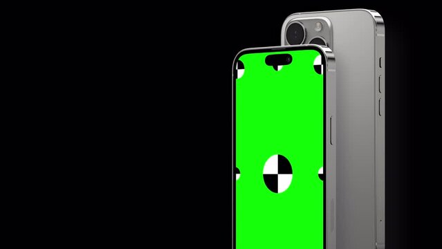 3D render of two smartphone with a green background. Rotating in screen. Green screen for easy keying with Alpha channel. Computer generated image. Easy customizable.