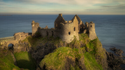 Front view of Dunluce Castle located on the edge of cliff, part of Wild Atlantic Way, Bushmills,...