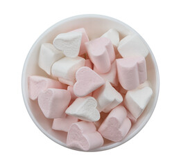 Marshmallow in a white plate on a white background. View from above