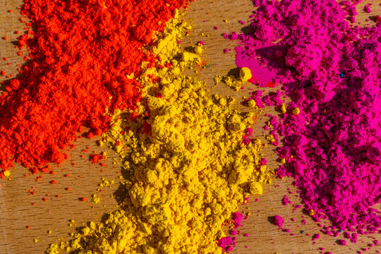 Bright colours for holi festival on the table, colourful Gulal. High quality photo