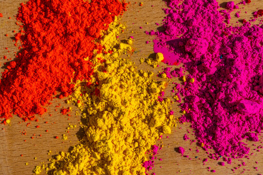 Bright colours for holi festival on the table, colourful Gulal. High quality photo