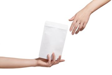 Female hand holds white cardboard packaging for tea/coffee/snack on transparent background. Branding and packaging mockup