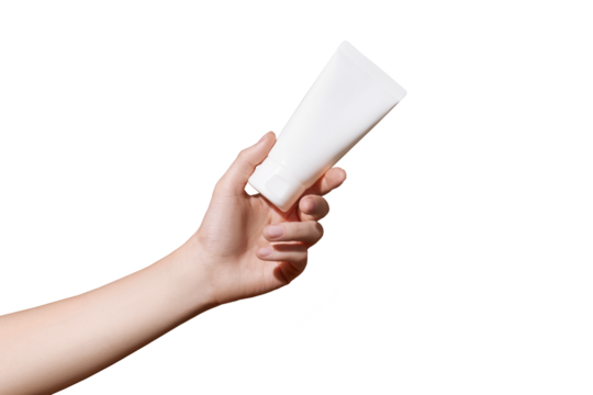 Hand holds blank white plastic tube on transparent background. Cosmetic beauty product branding mockup