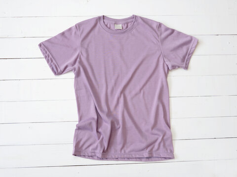 Purple T Shirt Mockup On White Wood Background