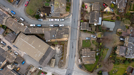 Aerial drone photo of the Village of Netherton near Huddersfield, in the Kirklees metropolitan borough of West Yorkshire, England showing the residential houses in the winter time