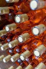 A bottle of Rosé wine among other bottles