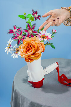 Woman with bouquet of flowers in megaphone