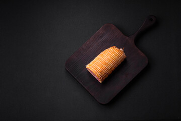 Delicious roll with meat, cheese, mushrooms, spices and herbs