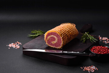 Delicious roll with meat, cheese, mushrooms, spices and herbs