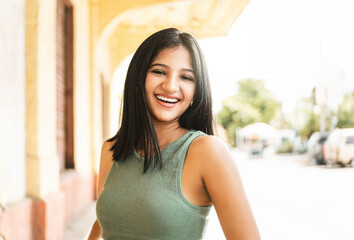 Portrait of girl smiling with perfect smile and white teeth.