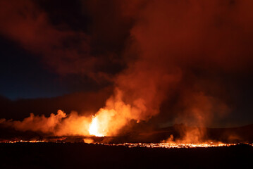 Fototapeta na wymiar Eruption smoke night clouds Iceland