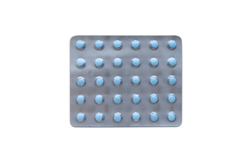 Medical blister packs with little blue pills isolated on white.