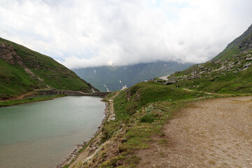 Fototapeta na wymiar Mountain panorama with reservoir Nassfeldspeicher near Grossglockner High Alpine Road, Austria