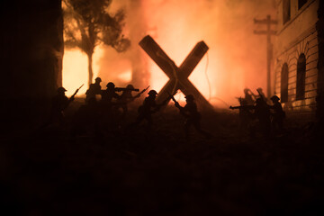 Concept of war or manipulation with global politics. The puppeteer controls soldiers. Night battle...