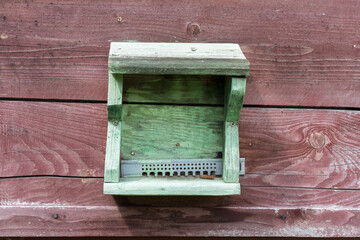 entrance window to the hive with entrance reducer