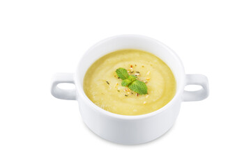 Zucchini soup in a bowl on a white isolated background