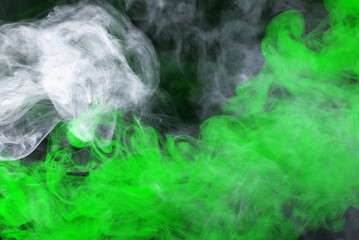 Green steam on a black background.
