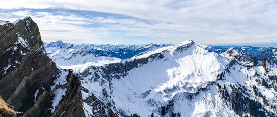 Winter Mountain Panorama with snow. Heahlekopf and Diedamskopf in the Alps, Vorarlberg, Austria. - 576083522