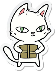 sticker of a cartoon cat holding parcel