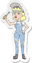 retro distressed sticker of a cartoon female mechanic