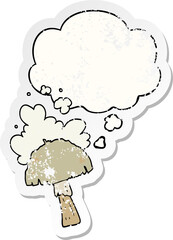 cartoon mushroom with spore cloud and thought bubble as a distressed worn sticker