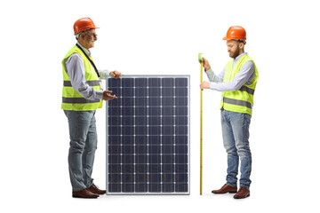 Male engineers measuring a solar panel