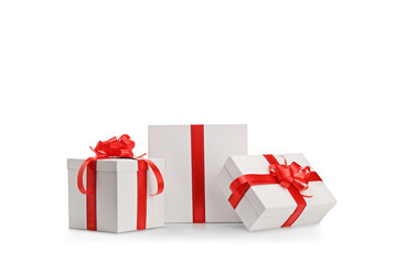 Present boxes with red ribbon in different sizes