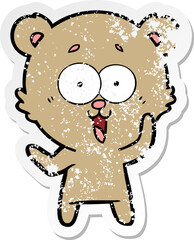 distressed sticker of a laughing teddy  bear cartoon