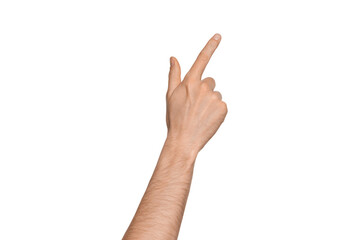 A man's hand points the direction with his finger. Points diagonally to the side.  Index finger pressing something. Isolate on a white background. - obrazy, fototapety, plakaty