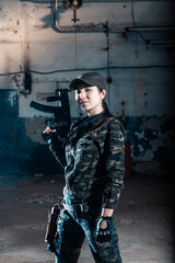 Fototapeta premium A person with a weapon. Character from the comic book The Punisher. Armed with a pistol and machine gun. A dangerous person who solves problems with force.