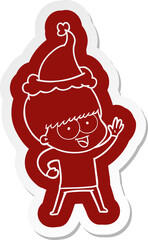 happy cartoon  sticker of a boy wearing santa hat