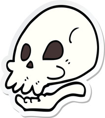 sticker of a cartoon skull