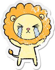 distressed sticker of a cartoon crying lion