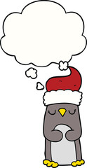 cartoon christmas penguin and thought bubble