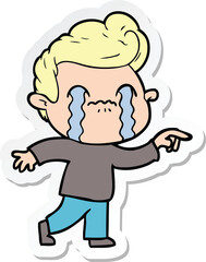 sticker of a cartoon man crying