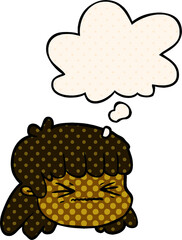 cartoon female face and thought bubble in comic book style