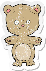 Fototapeta premium retro distressed sticker of a cartoon happy teddy bear